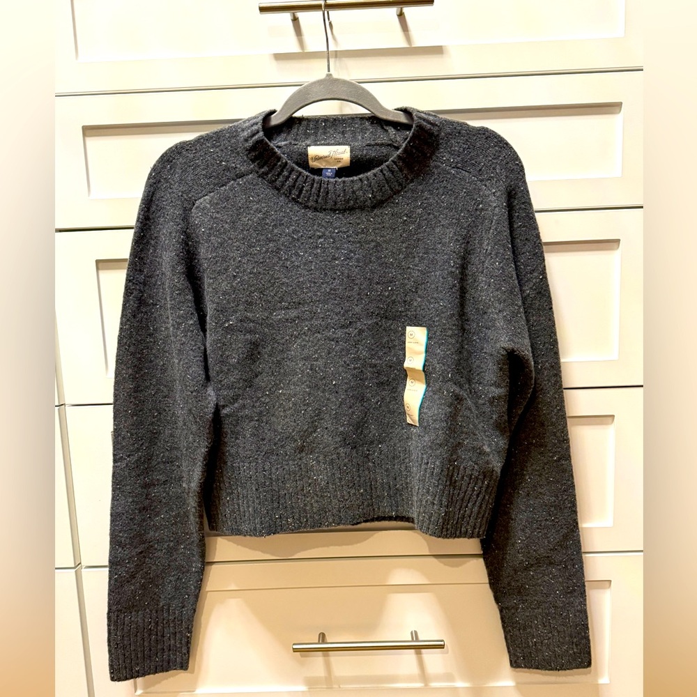 Women’s gray sweater size M.